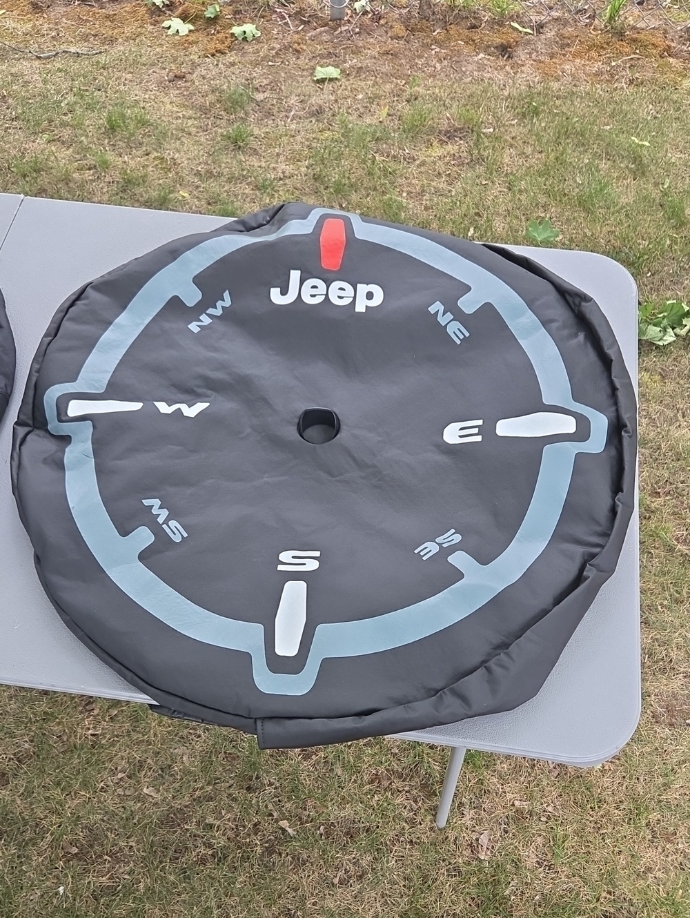 Jeep Black Spare Tire Cover with Light Blue Compass and Red Accent